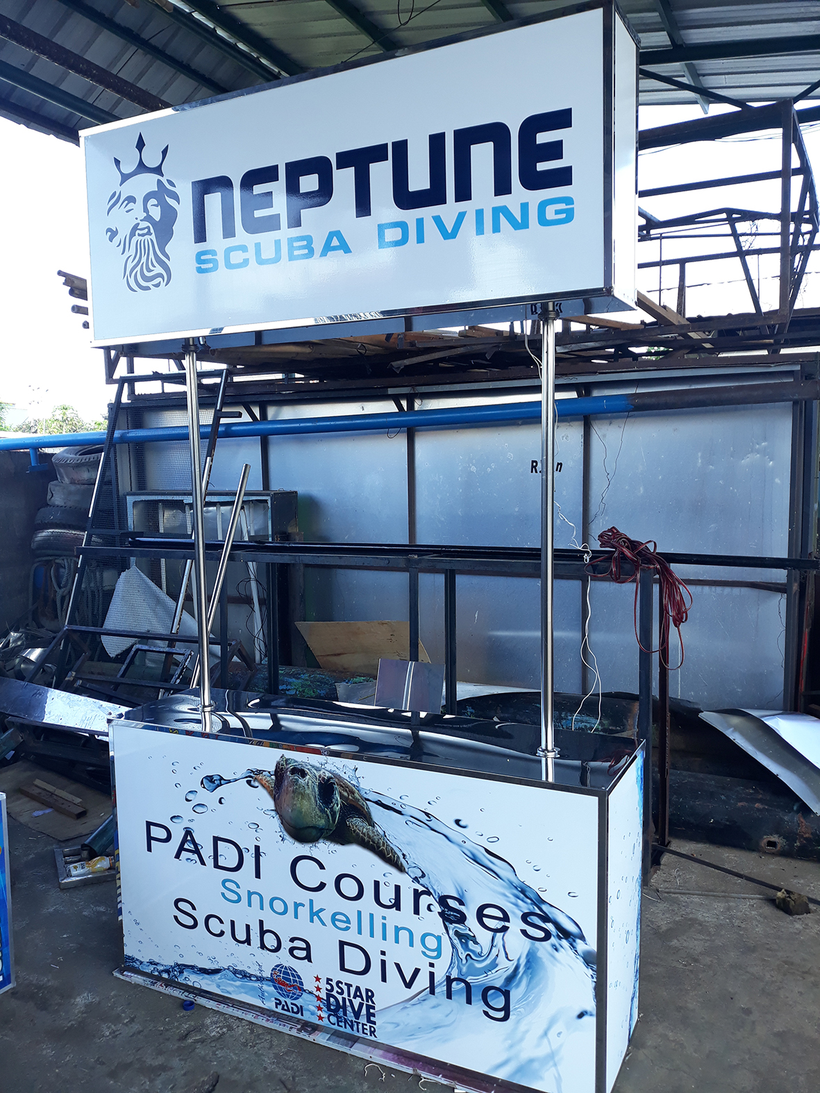 Stand Table Stainlessteel & Acrylic Sticker NEPTUNE SCUBA DIVING BALI Stand Table Stainlessteel & Acrylic Sticker NEPTUNE SCUBA DIVING BALI